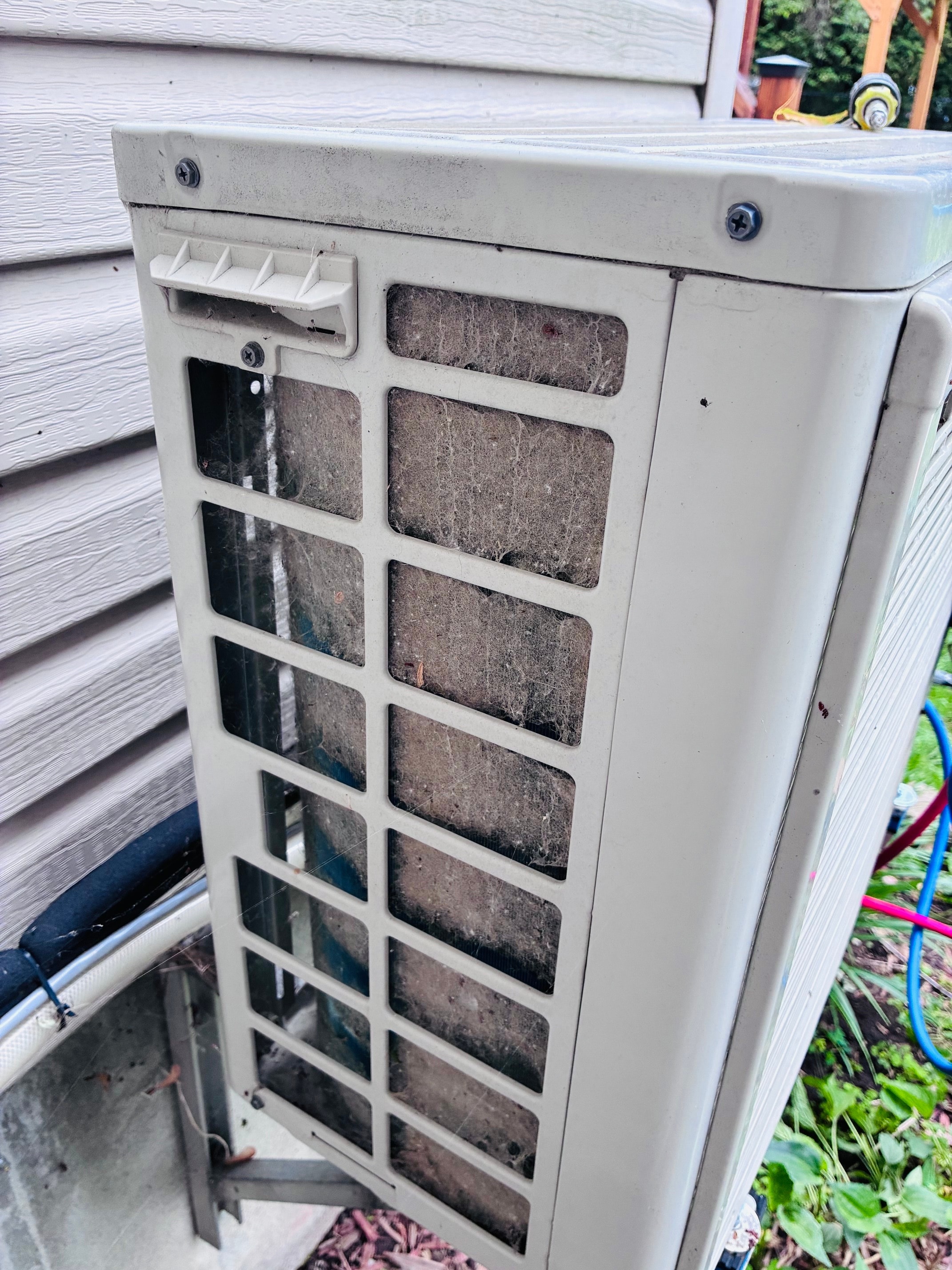 Dirty clogged HVAC evaporator coil before cleaning